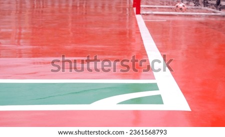 Focus at the edge corner of colorful outdoor futsal court background in wide screen view