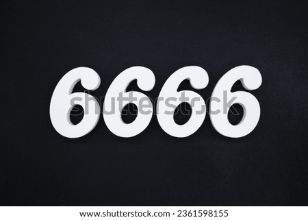 Black for the background. The number 6666 is made of white painted wood.