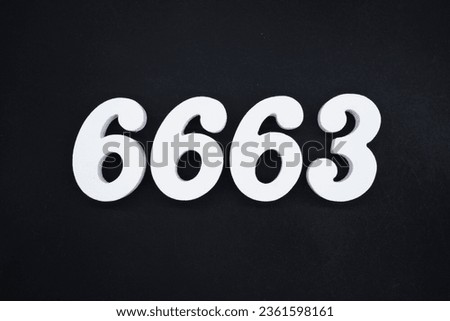 Black for the background. The number 6663 is made of white painted wood.