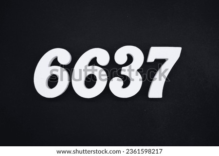 Black for the background. The number 6637 is made of white painted wood.