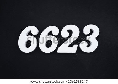 Black for the background. The number 6623 is made of white painted wood.