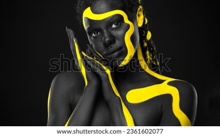 African black and yellow art on the models face. Download high resolution picture for music cover.