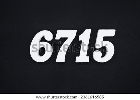 Black for the background. The number 6715 is made of white painted wood.