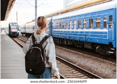 Travel.Eco travel by train,woman traveling alone,digital nomad,bleisure,work travel,nomad aesthetic,nomadding,road trip solo,memoon,solo honeymoon Royalty-Free Stock Photo #2361644699