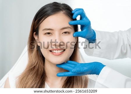 Cosmetic surgery, beauty, Surgeon or beautician touching woman face, surgical procedure that involve altering shape of eye, medical assistance, eyelid surgery, double eyelid, big eyes, ptosis Royalty-Free Stock Photo #2361653209
