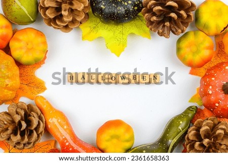 the inscription "Halloween" with pumpkins  on a white background.