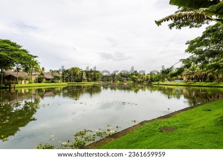 Beauty of the reflections on water along with the reflection of clouds at Zuri Resorts, Kumarakom , Kerala . The picture depicts the beauty of symmetry's of nature and buildings and structures