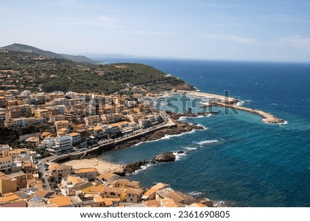 Aerial panoramic view of the medieval town of Castelsardo , Sassari in Sardinia . The town has a characteristic castle on top of the town attraction for many touristic visiting the italian island 