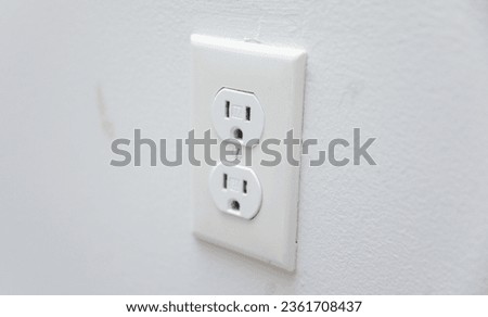electrical outlet plug, symbolizing energy connection and electrical power source Royalty-Free Stock Photo #2361708437
