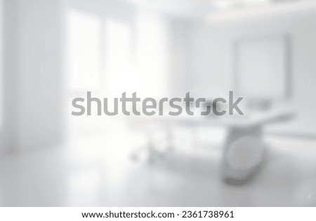 Modern blue business room with table and chair as background. Abstract blur and defocus effect background