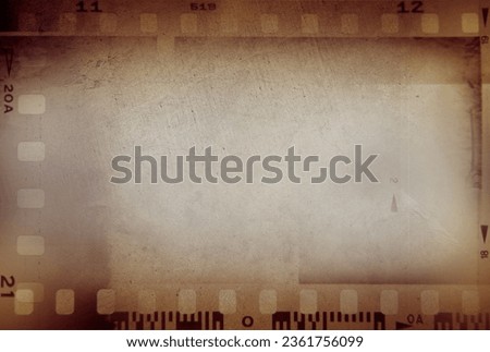Film negatives frames brown background
