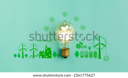 Green energy concept. Lightbulb with eco icon on a green background. ESG or environmental social governance. The company developed a nature conservation strategy.

