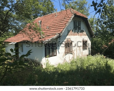 Old dilapidated house in Bosnia and Herzegovina  Royalty-Free Stock Photo #2361791733