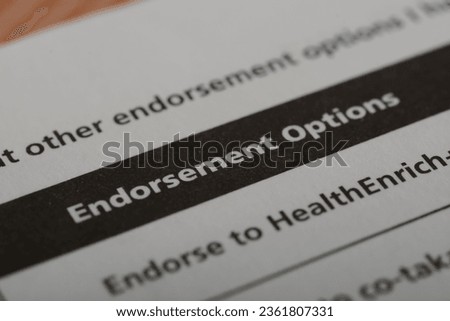 ENDORSEMENT OPTIONS. An endorsement option refers to a provision or choice within an insurance policy that allows the policyholder to make certain modifications or additions to their coverage Royalty-Free Stock Photo #2361807331