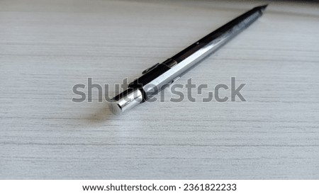 black pencil on office desk background