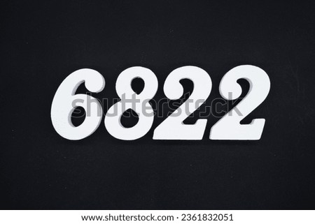 Black for the background. The number 6822 is made of white painted wood.
