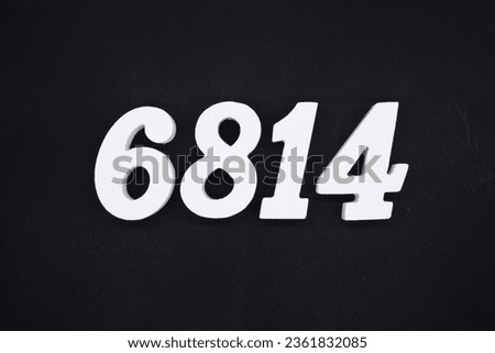 Black for the background. The number 6814 is made of white painted wood.
