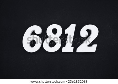 Black for the background. The number 6812 is made of white painted wood.
