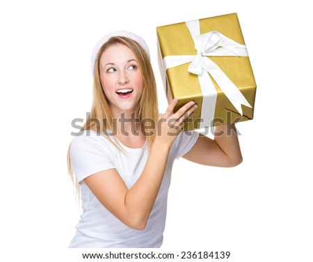 Xmas woman guess the present in box