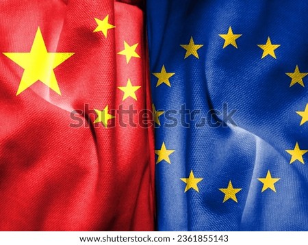 The Chinese flag and the European Union flag are made of fabric patterns. Concept map depicting dialogue between China and the European Union. Basemap and background concept. Double exposure hologram. Royalty-Free Stock Photo #2361855143