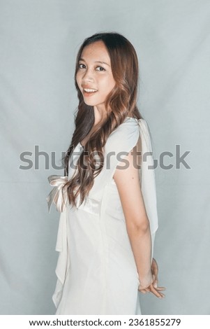 Curly wave iron hair, catok klintong, cute girl model Balinese Indonesian Asian, beauty salon make up