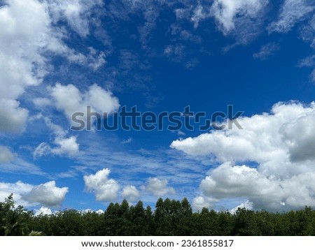 Blue Sky and clouds. Sunshine autumn Royalty-Free Stock Photo #2361855817