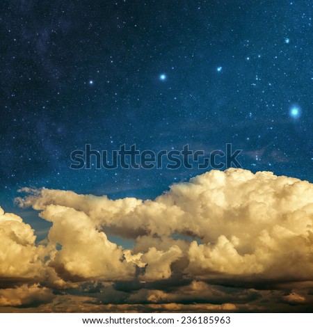 clouds and stars on a textured vintage paper  background Elements of this image furnished by NASA Royalty-Free Stock Photo #236185963