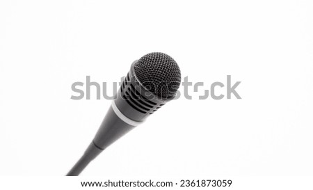 Close-up photo of microphone head isolated on a white background.
