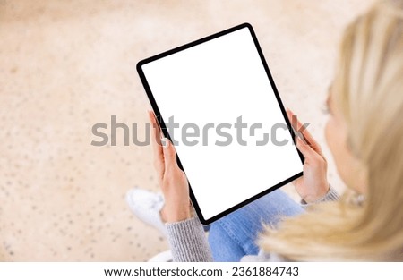 Woman using digital tablet, vertical  screen mockup