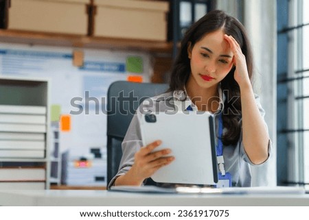 Financial Recession Struggles, stressed businessperson surrounded by declining charts and graphs, representing challenges faced by Finance People during economic downturns. Disappointment in Business