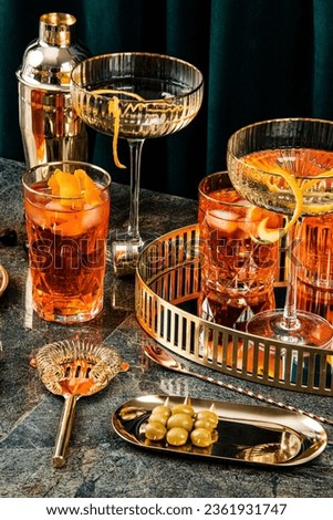 cocktails in art deco style. Elegant party with drink and some bit. Royalty-Free Stock Photo #2361931747