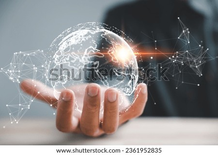 Global Business Intelligence, A businessman uses a digital interface to analyze data, unlocking insights for strategic decision-making. world map composition signifies international reach of business. Royalty-Free Stock Photo #2361952835