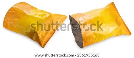 Empty Foil and plastic snack bags mockup isolated on white background, Yellowl pillow packages for food production, snack wrappers on White Background With clipping path. Royalty-Free Stock Photo #2361955163