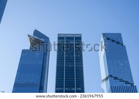 Manhattan buildings picture shot on a clear sky of 3 buildings.