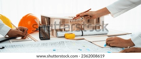 Worker, architect and engineer work on real estate construction project oratory planning with cartography and cadastral map of urban town area to guide to construction developer business plan of city Royalty-Free Stock Photo #2362008619