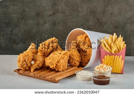 A collection of pictures of fried chicken and potatoes