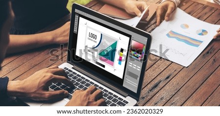 Graphic designer software for modern design of web page and commercial ads showing on the computer screen