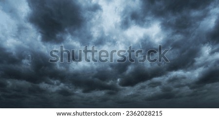 Dark clouds before a thunder-storm. Royalty-Free Stock Photo #2362028215