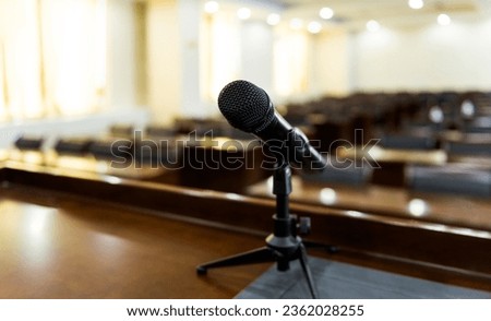 Speaker's table in the conference room. Royalty-Free Stock Photo #2362028255
