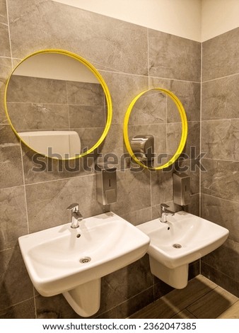 modern interior design in public toilet. public bathroom