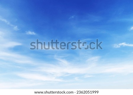 Fantastic soft white clouds against blue sky background Royalty-Free Stock Photo #2362051999