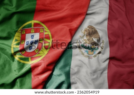 big waving national colorful flag of portugal and national flag of mexico . macro