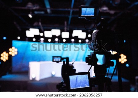 TV studio set with LED screen camera and light Royalty-Free Stock Photo #2362056257
