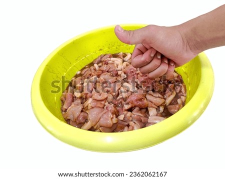 The picture of the pork that has been marinated for 1 night gives a thumbs up. On a white background.