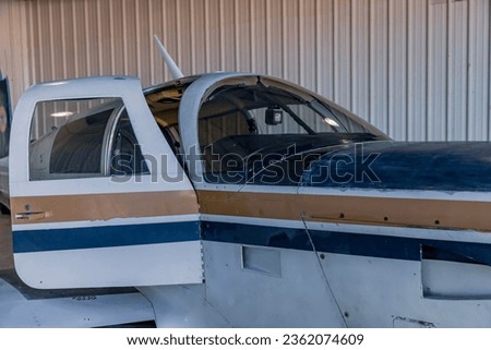 Here's a high-definition picture of a propeller aircraft and an image of a plane, hangar, and aircraft. You're welcome to use them for free.