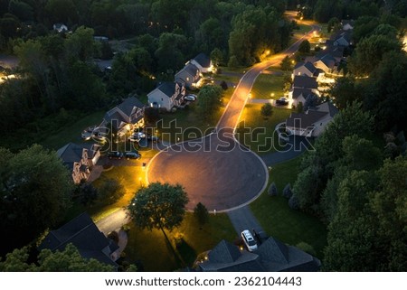 Spacious new single family homes in upstate New York residential area at night. Real estate development in american suburbs Royalty-Free Stock Photo #2362104443