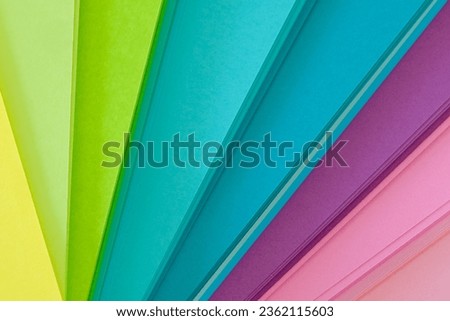 Colored paper in bright tones fanned out