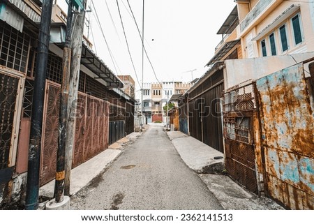 Vibrant city alley with impressive architecture and captivating urban surroundings. Royalty-Free Stock Photo #2362141513
