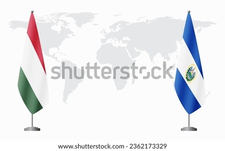 Hungary and El Salvador flags for official meeting against background of world map.
