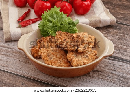 Homemade Fried salmonn cutlet in the bowl